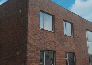 witte aanslag op gevel