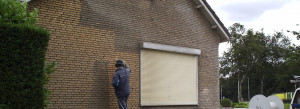 zandstralen van de gevel